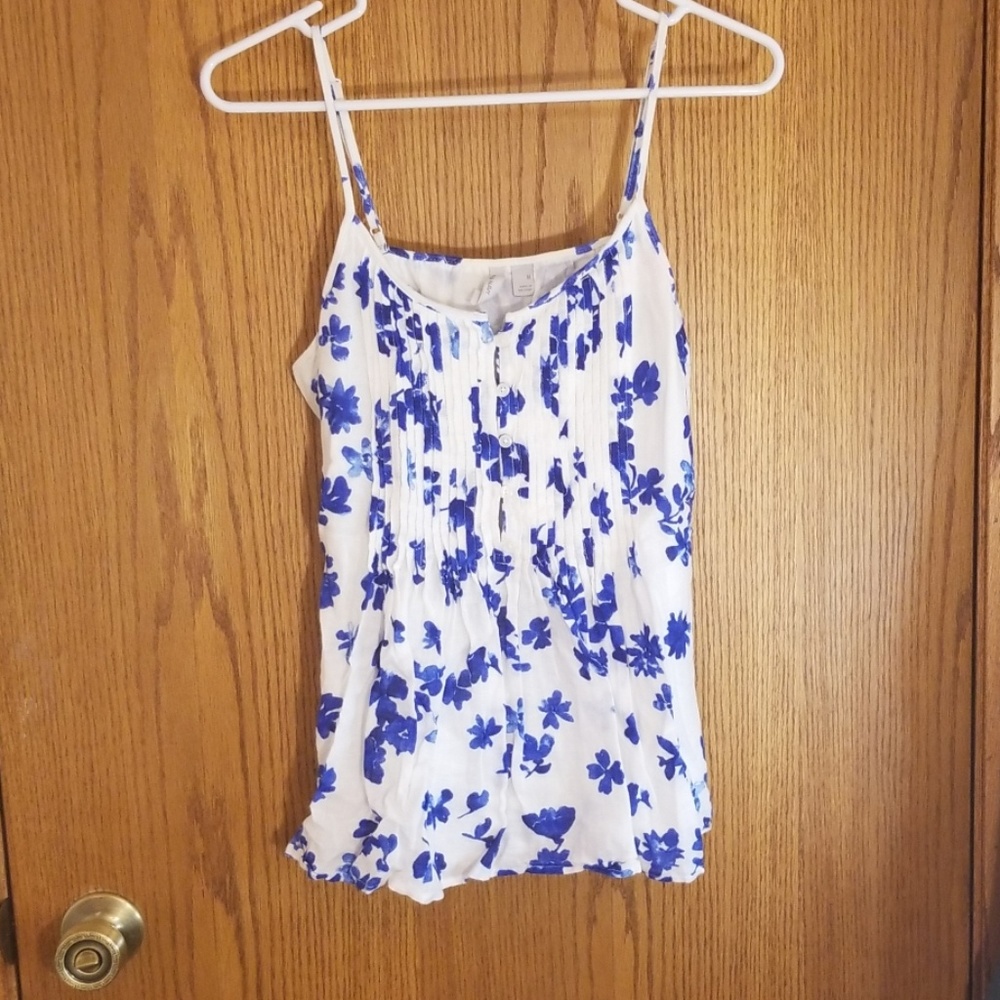 White tank top with blue floral design